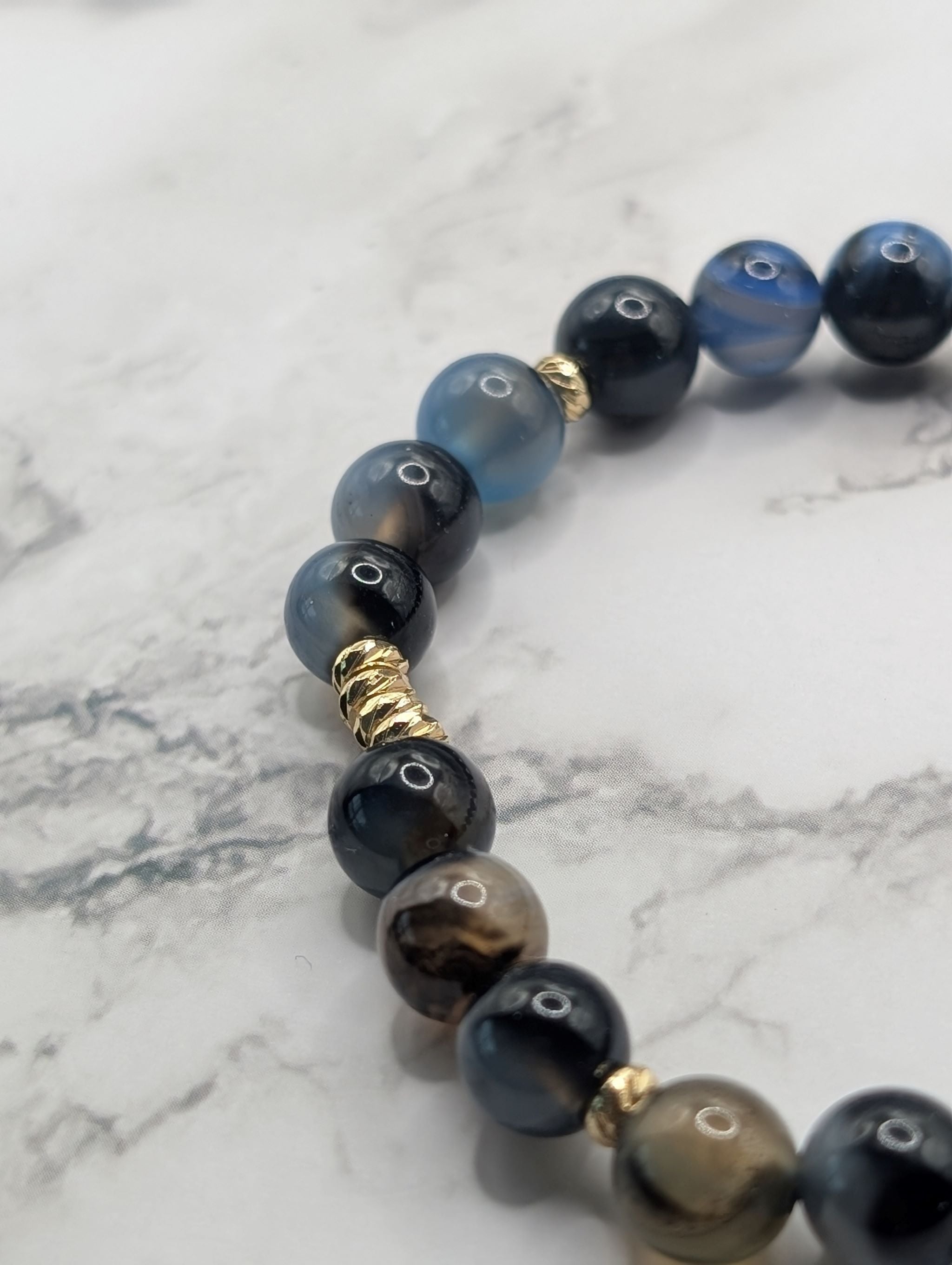 Black line agate gold accent stretch bracelet close-up detail