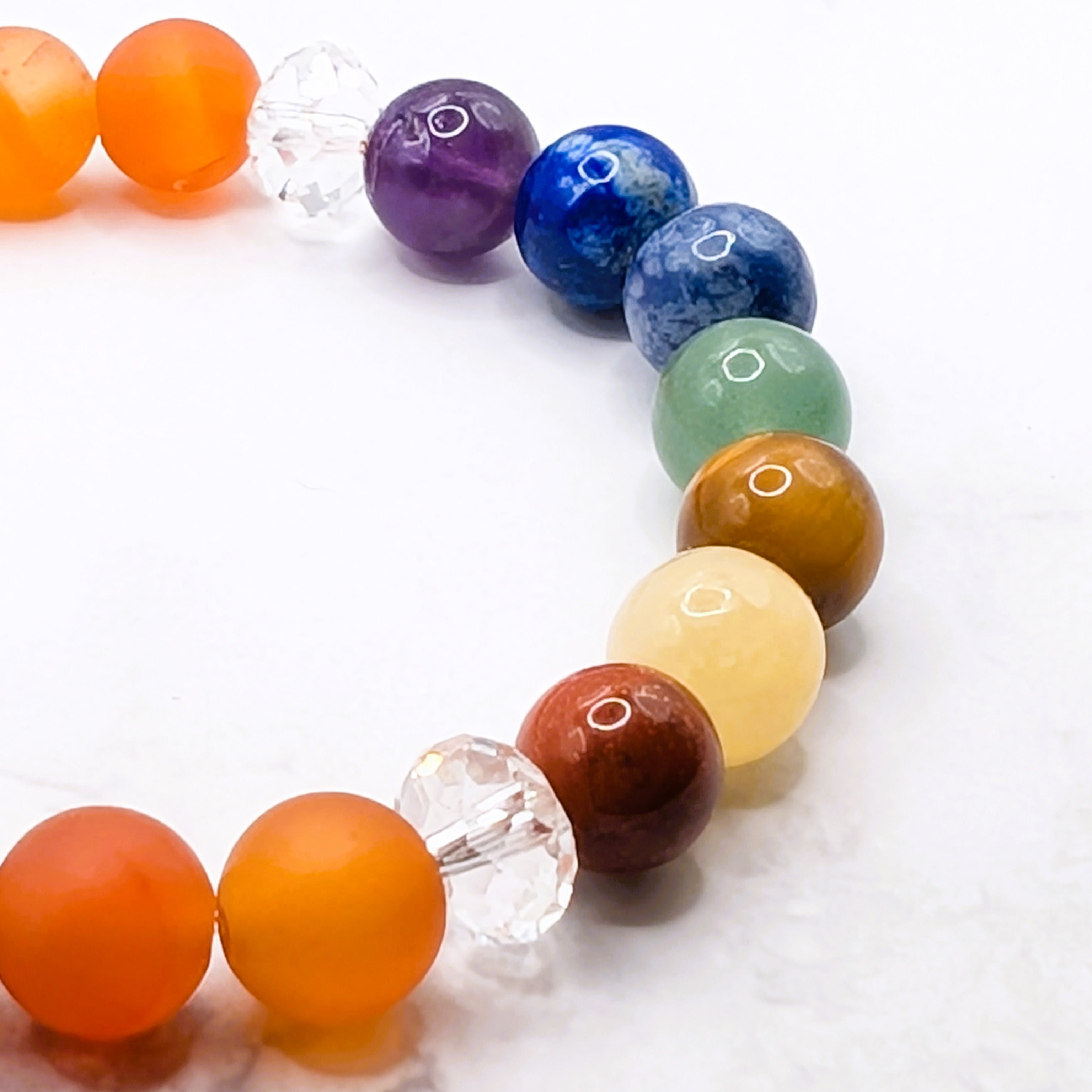 Carnelian chakra stretch bracelet detail, natural gemstone energy jewelry