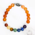 Handmade chakra bracelet with vibrant carnelian beads for energy and healing