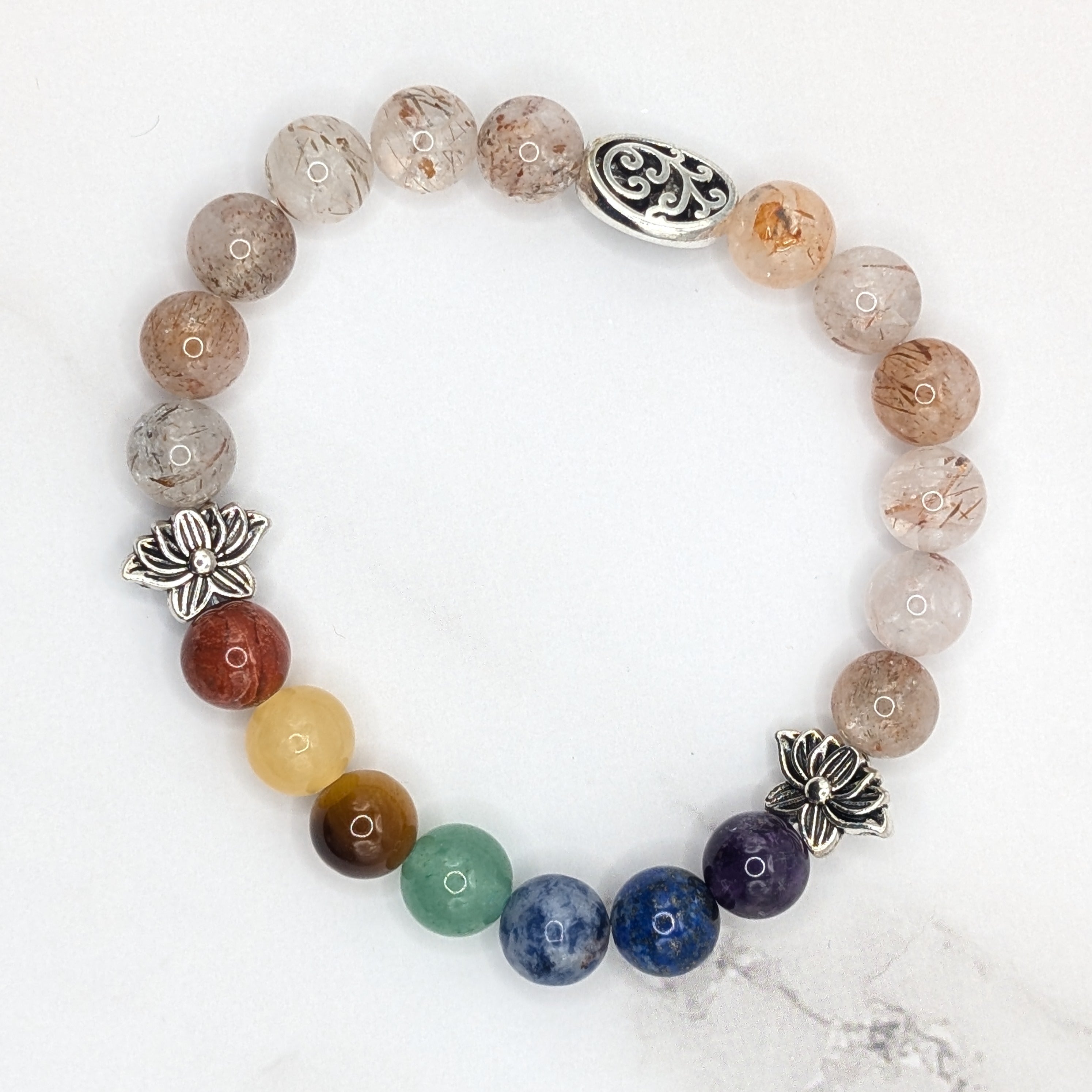 Handmade chakra bracelet with sakura agate and silver lotus beads