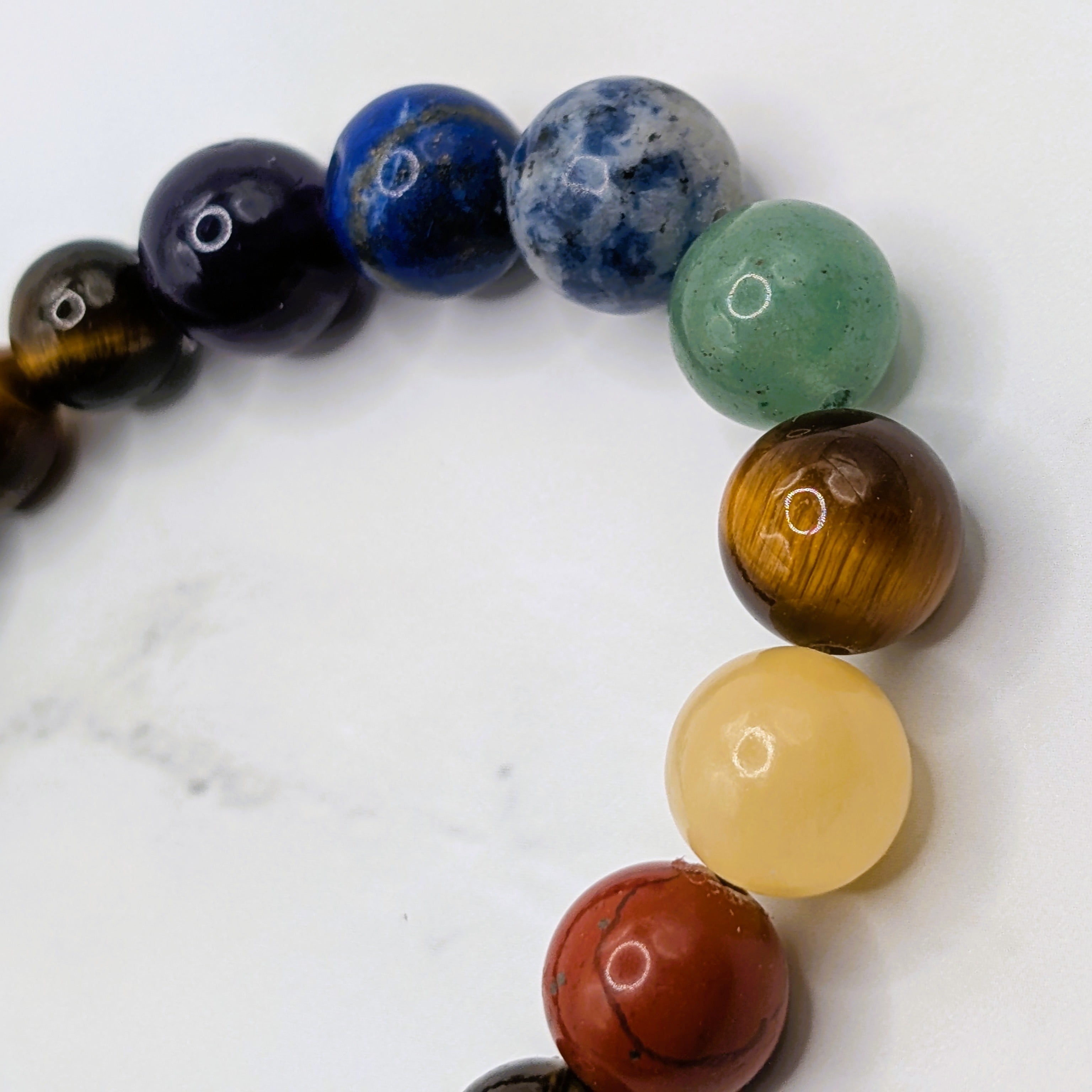 Chakra lava bead stretch bracelet detail, natural gemstone healing jewelry