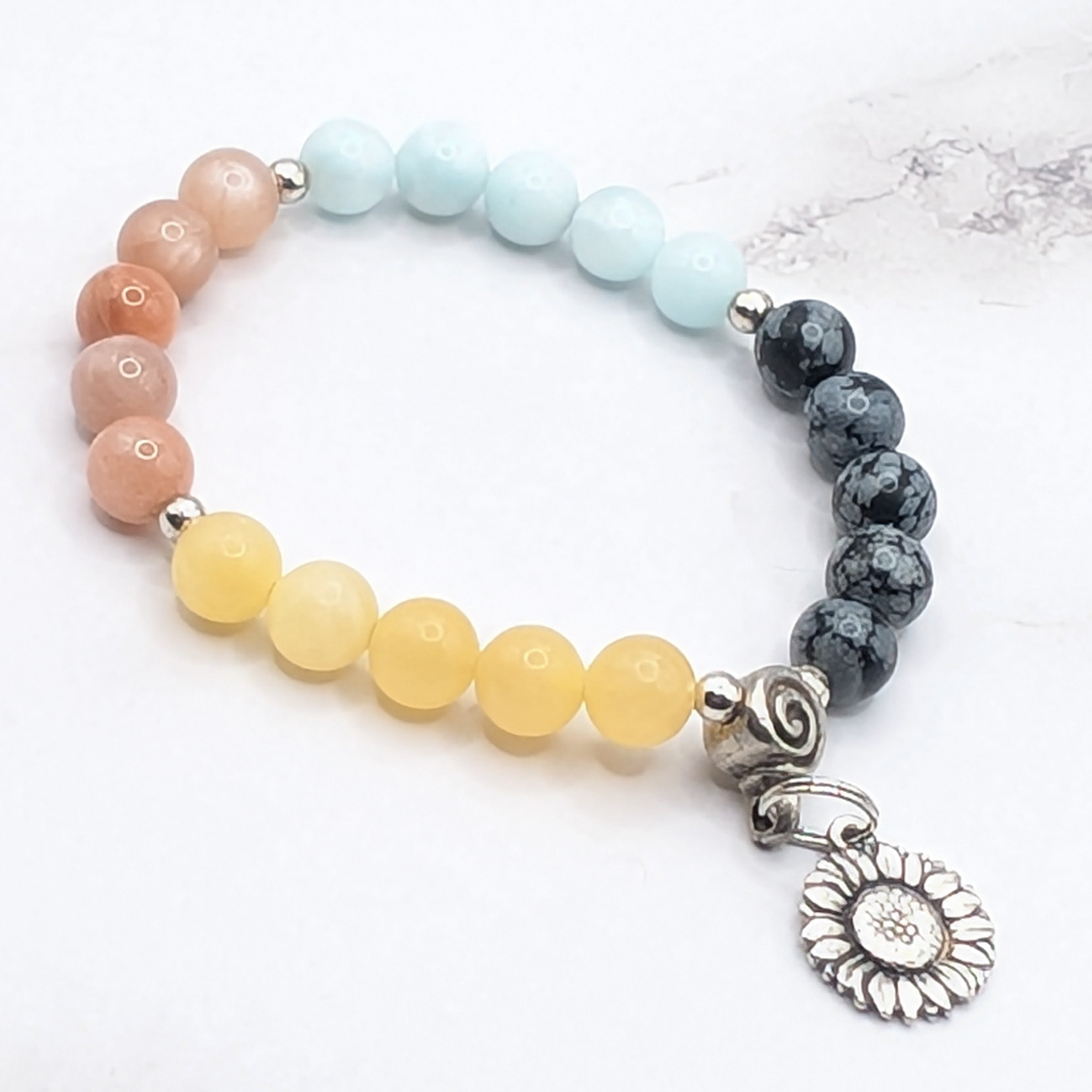 Four gemstone sunflower charm bracelet detail, handcrafted natural stone jewelry
