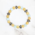 Handmade honey stone and green angelite stretch bracelet with lotus bead accents