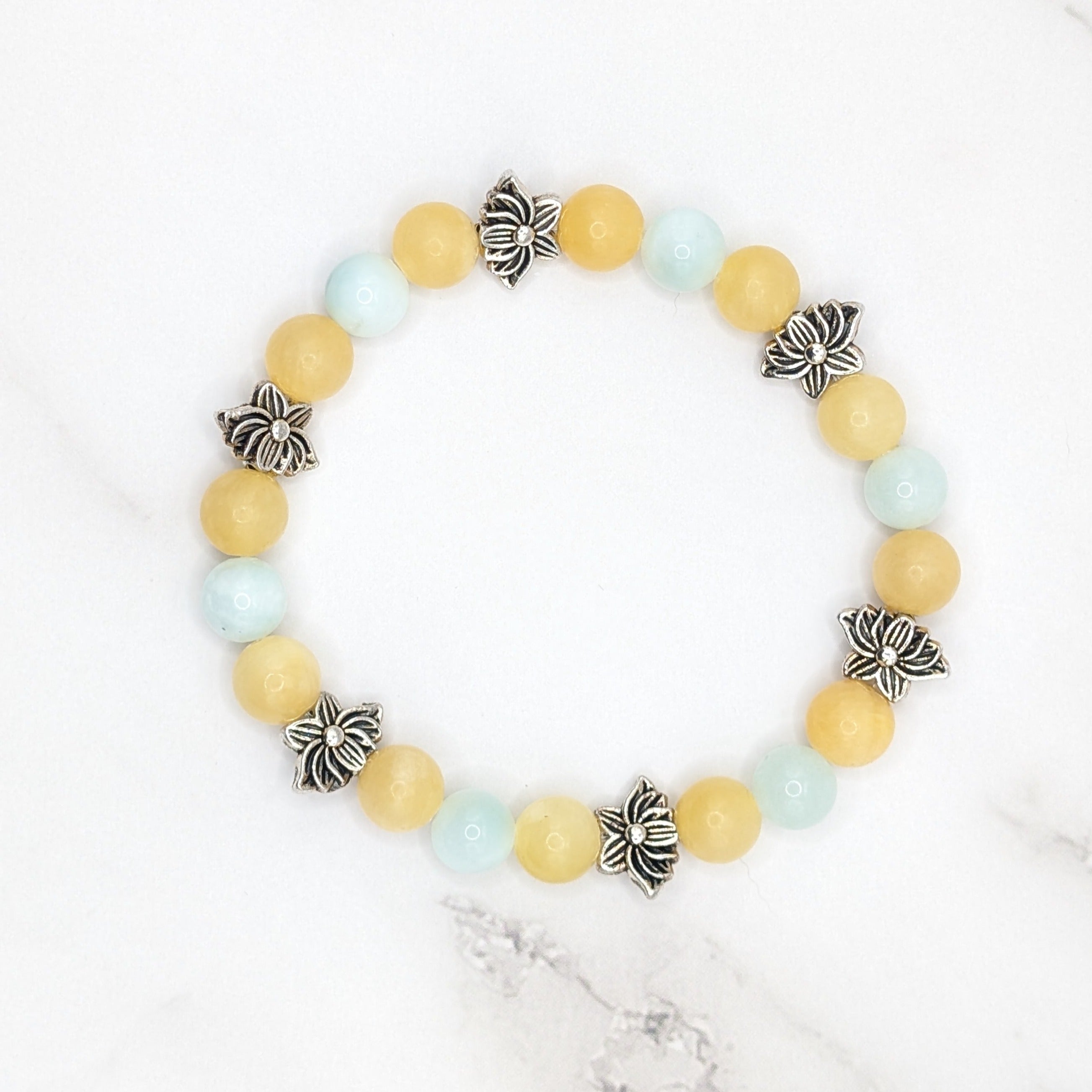 Handmade honey stone and green angelite stretch bracelet with lotus bead accents