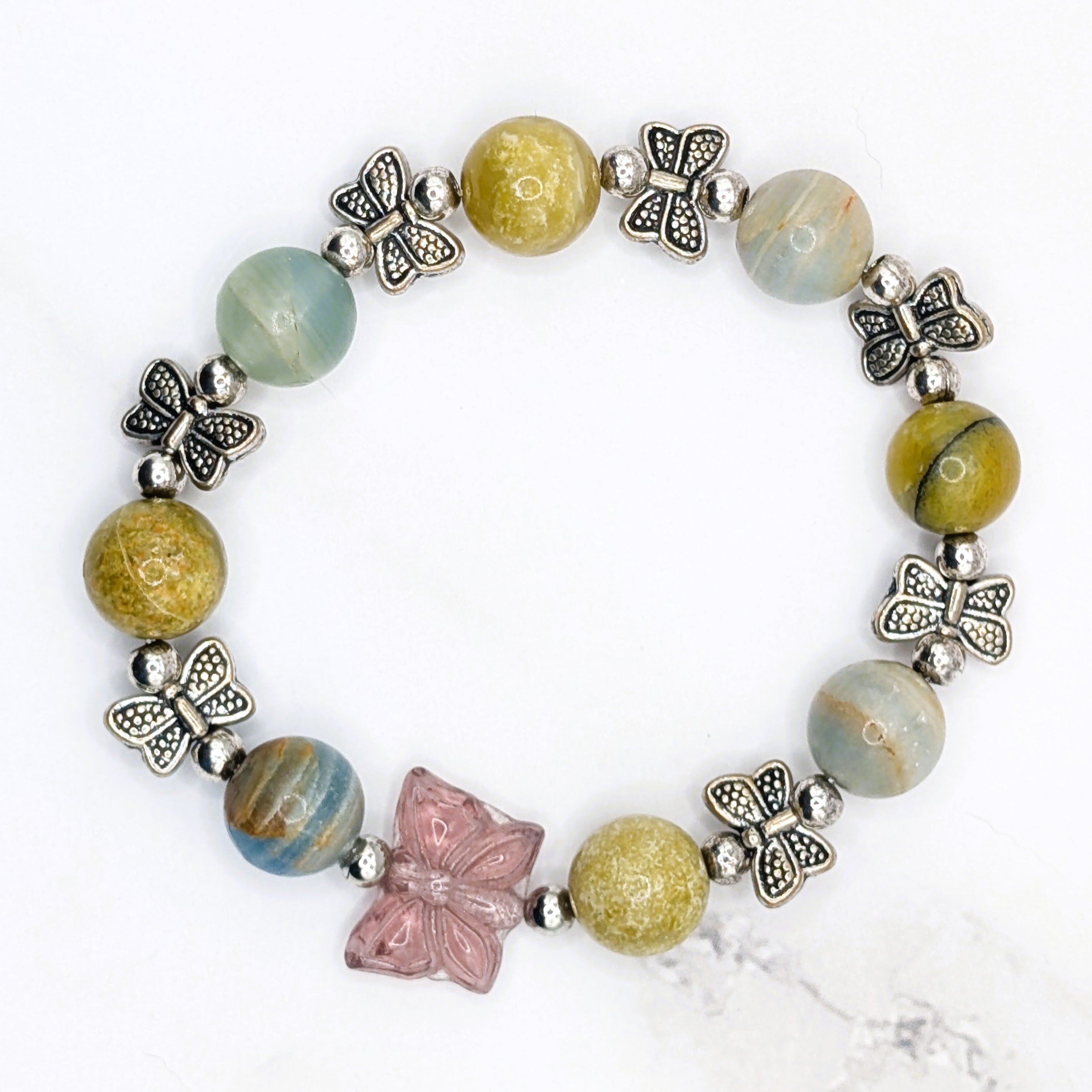 Handmade olive opal and blue calcite stretch bracelet with Czech glass butterfly charm
