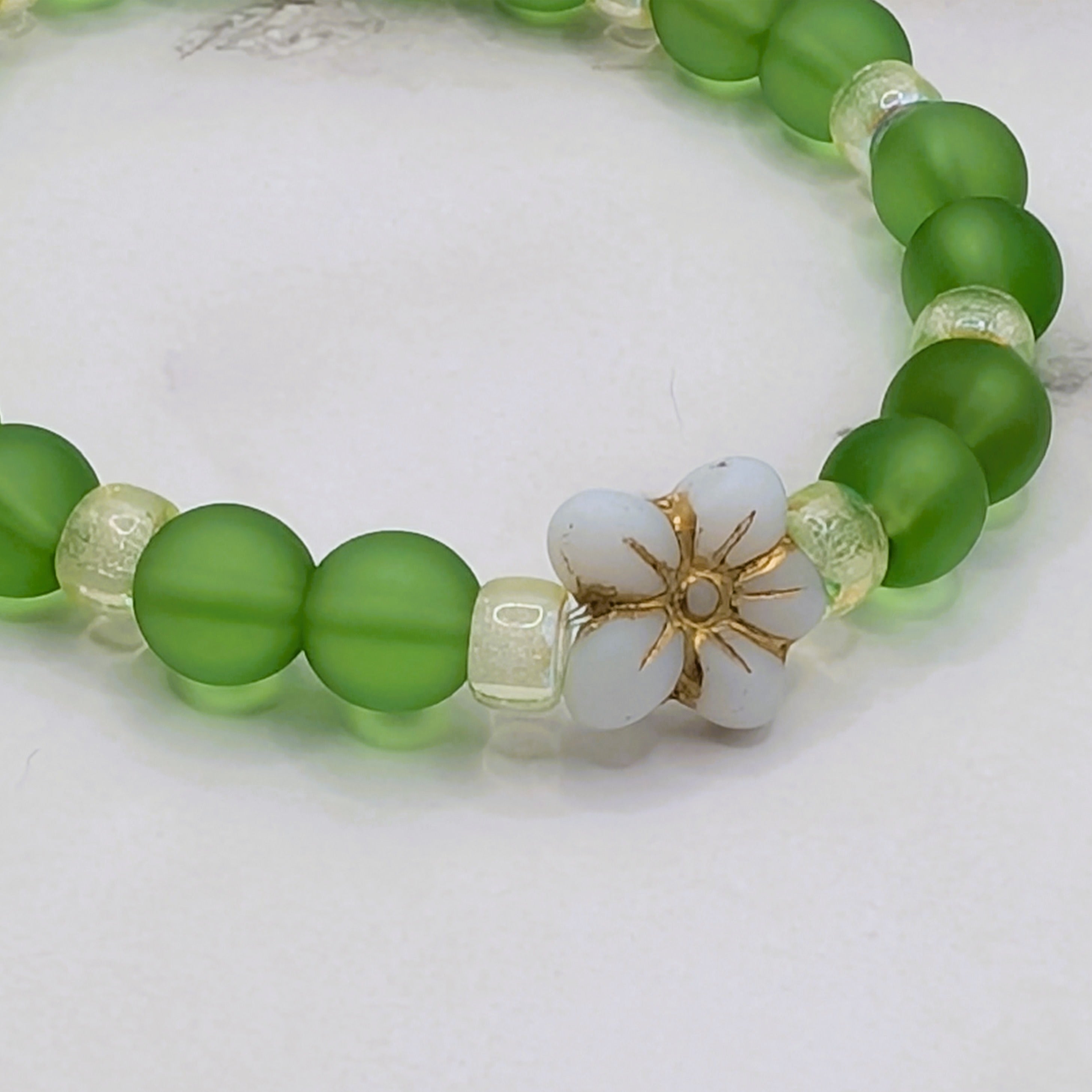 Peridot green beach glass Czech lemon ice flower accent bracelet detail