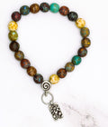 Handmade stretch bracelet with Czech glass Picasso beads and lotus charm