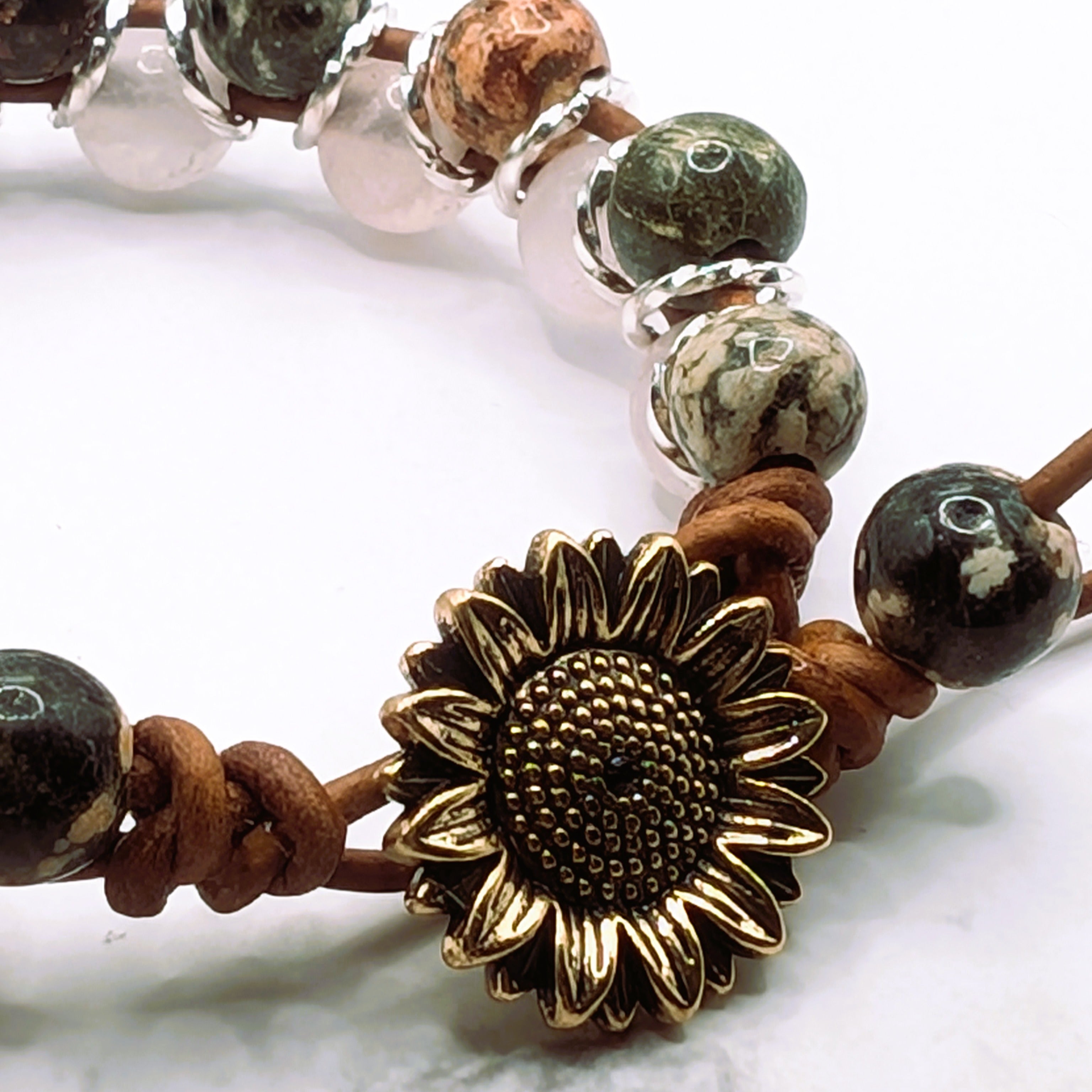Rose quartz red snowflake leather bracelet sunflower clasp detail, artisan gemstone jewelry