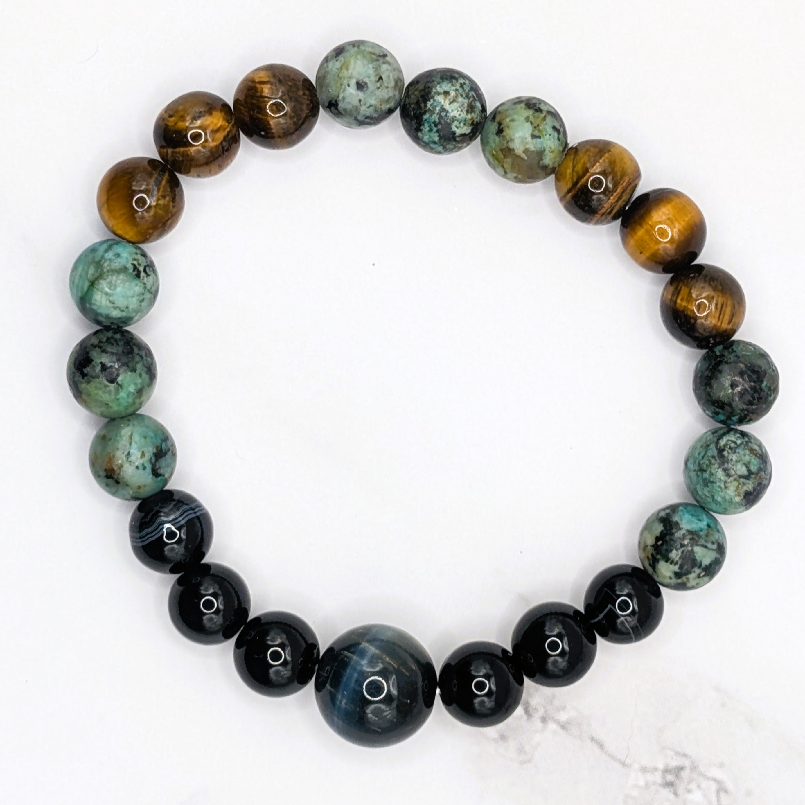 Handmade multi-stone stretch bracelet with black sardonyx, tiger eye and African turquoise