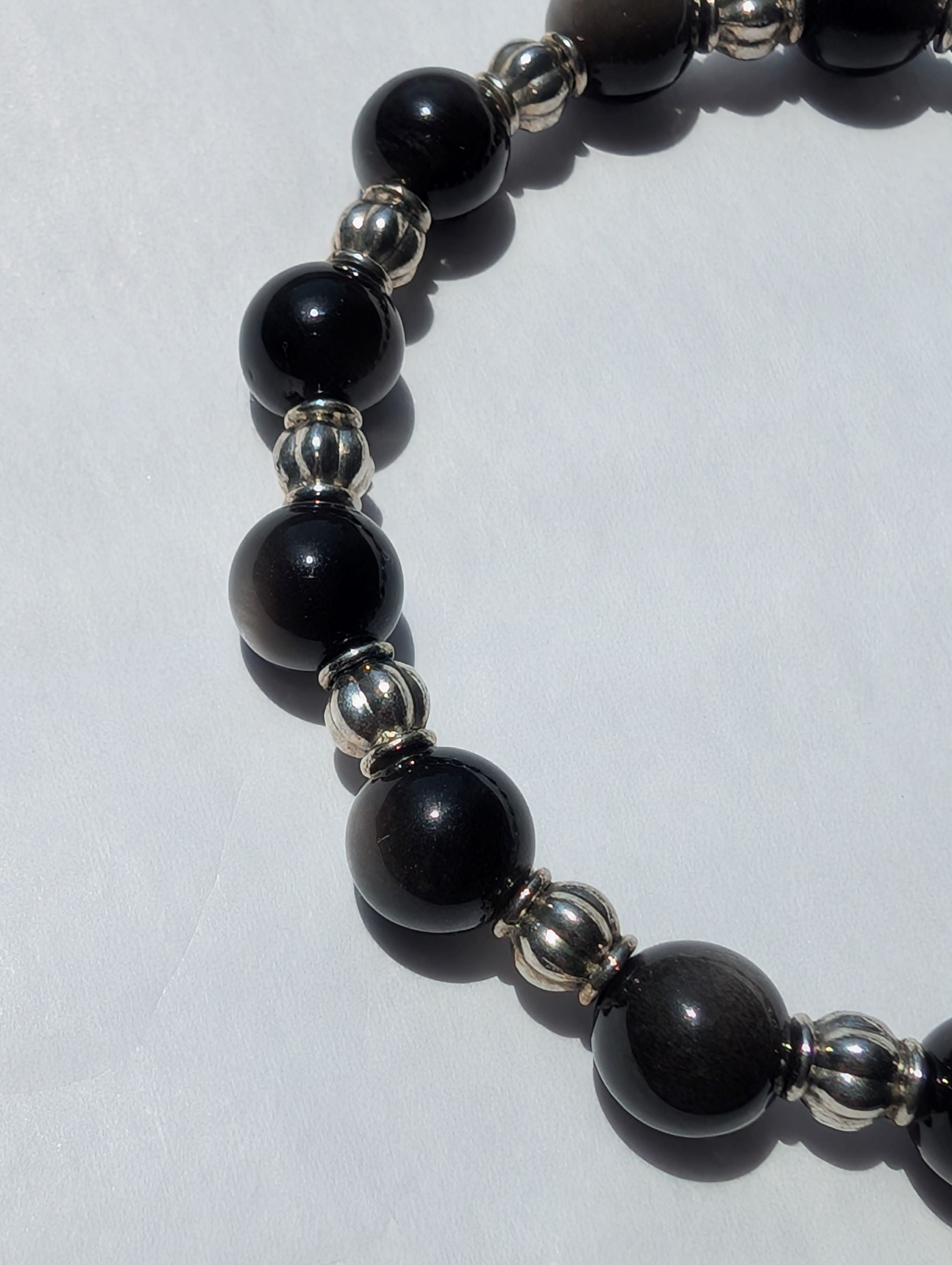 Silver sheen obsidian silver accent stretch bracelet detail, natural gemstone jewelry