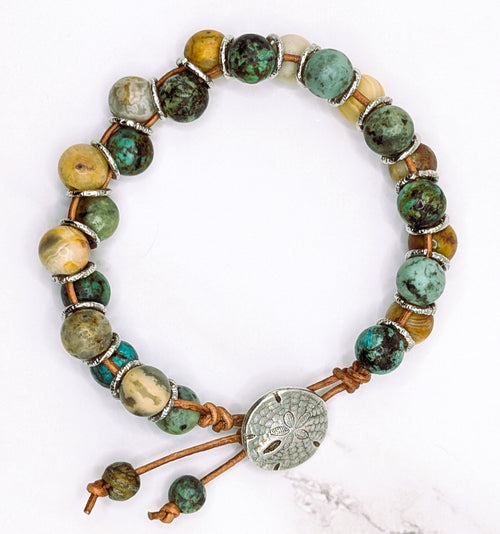 Handmade African turquoise and jasper leather bracelet with sand dollar clasp
