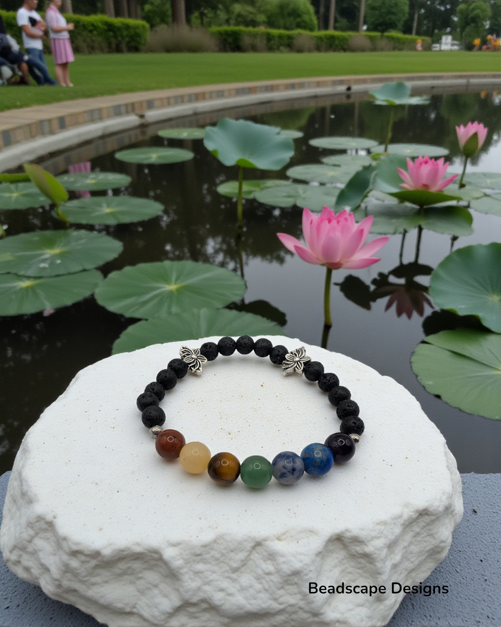 Handmade Chakra Bracelet with Gemstones and Lotus Accents - Stretch