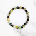 Handmade China chrysoprase stretch bracelet with wood accent beads, flat lay